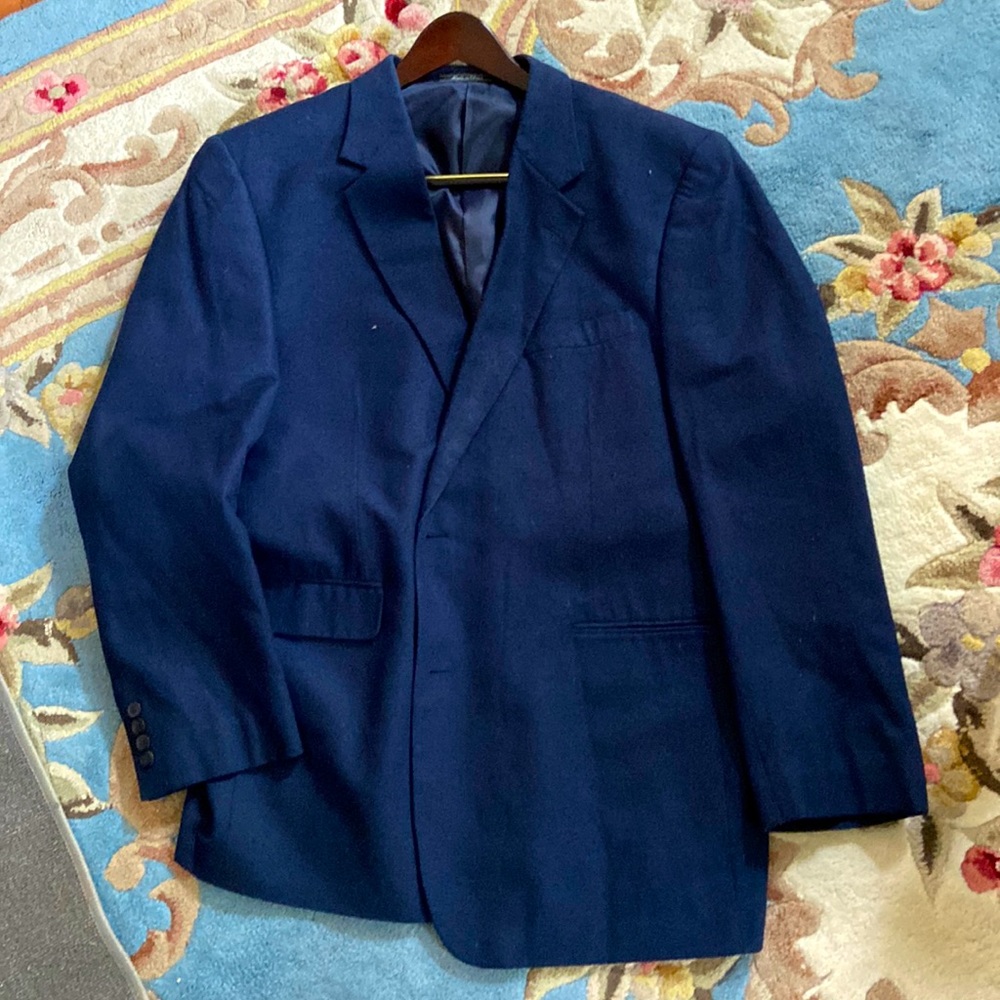 100% silk suit jacket in like new condition.